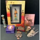 An African picture, in relief with Zulu mother and children; a cork diorama; resin dragon trinket