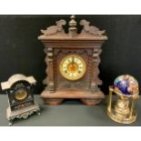 A late 19th century German wall clock, 46cm high, c.1870; a 20th century globe clock; etc (3)