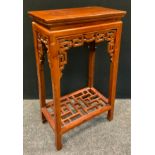 A Chinese carved Padauk-type wood, small occasional table / pot stand, 76cm tall x 43cm wide.