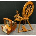 A spinning wheel, of traditional form; a small loom (2)
