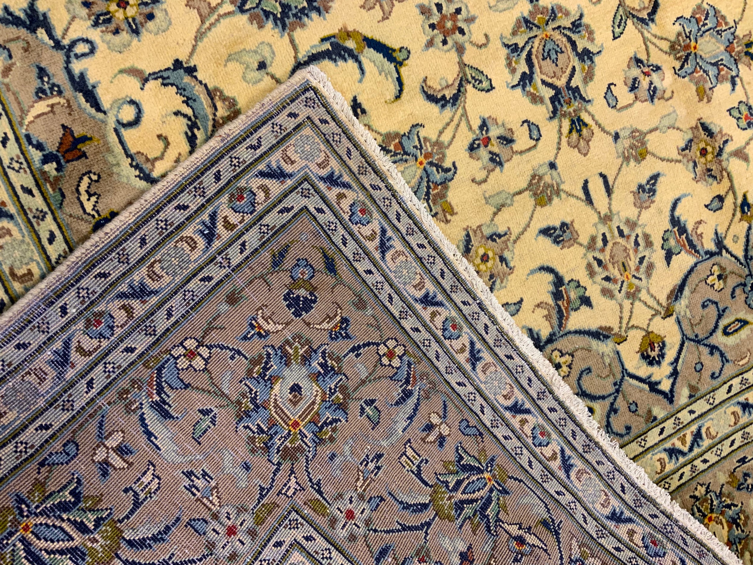 A fine Kashan rug / carpet, woven in muted tones of grey, blue, and cream, 310cm x 205cm. - Image 2 of 2