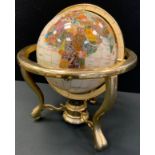 A contemporary gilt metal mounted revolving globe, 36cm high