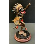 An R J Murphy painted bronze coloured metal figure, Spirit of the Thunderbird, 26.5cm high