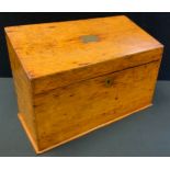 A late 19th century oak stationery box, slope top, fitted interior, 25cm high, 36cm wide, c.1880