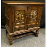 An oak Jacobean revival side cabinet, 84.5cm tall x 76.5cm wide x 43.5cm deep