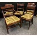 A set of four Regency mahogany dining chairs, drop in seats, c.1815; an inlaid mahogany bar back