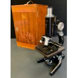 A Watson and Barnett, Service II model, monocular microscope, complete with x10 and x6 eye-pieces,