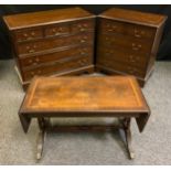 A reproduction George III style mahogany chest of three short over three long drawers, satinwood