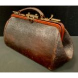 A Vintage faux Crocodile skin leather doctors bag, late 19th, early 20th century.