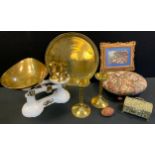 A set of white and brass kitchen scales and weights; a pierced pomander; a pair of brass