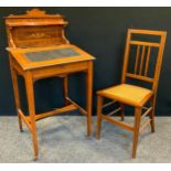 A Victorian inlaid ladies writing desk, shaped shelved gallery, pen tray, sloped leather lined
