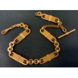 A Canadian gilt metal fancy link Albert Chain, T bar terminal, 33cm long, stamped L R Canada