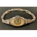 A Rolex Art Deco ladies 935 silver cased bracelet wristwatch, oval silvered dial, Arabic Numerals,