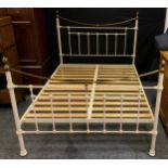 A Victorian style brass and metal double bed, 142cm wide