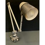 A mid 20th century BHI Lo-Vo-Lite angle poise lamp, grey tubular three section arm, mountable base