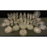 Glass - a set of six 1920s champagne coups; pair of cut glass stoppered decanters; champagne flutes,