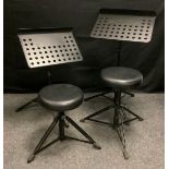 A pair of adjustable rise-and-fall musicians tripod stools; a pair of adjustable music stands, (4).