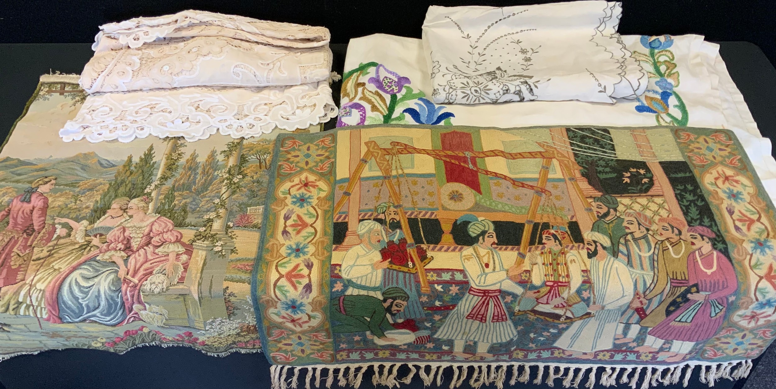 Textiles - a large 19th century hand embroidered crewel work table cloth; Middle eastern panel,