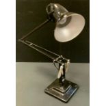 A Herbert Terry company, 2 section angle-poise lamp, black, 83cm tall.