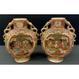 A pair of Japanese Satsuma moon flask vases, each decorated with figures within elaborate scroll and