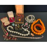 Costume Jewellery - a vibrant amber coloured resin bead necklace; similar colour bangle; rock