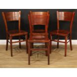 A set of four pre-Thonet merged Austro-Hungarian Empire parcel-bentwood side chairs, by Mundus,