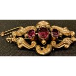 A late Victorian gold plated metamorphic pendant/brooch, set with three graduated faceted amethyst