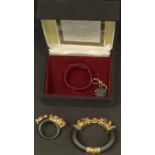 A Franklin Mint Duchess of Windsor Panther Bracelet and Brooch set, 22ct gold plated, ruby chip