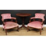 A pair of late Victorian/Edwardian tub-shaped club elbow chairs, 73.5cm high, 63cm wide, the seat