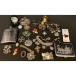 A Siam silver cigarette case; a pewter boudoir candlestick as a lily pad with dragonfly; mother-of-