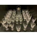 Nine cut glass brandy glasses; eight wine glasses; others, beakers, sherry; a cut glass EPNS mounted