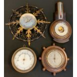 A Walker and Hall barometer, leafy wirework frame; an oak barometer; others (4)