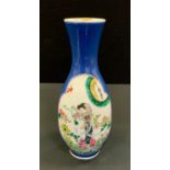 A Chinese slender ovoid vase, decorated with two shaped cartouches each with oriental figures and