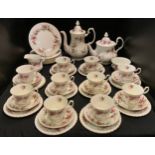 A Royal Albert Lavender Rose dinner and tea ware, comprising 8 dessert plates, 10 cups and