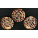 A set of three Royal Crown Derby 1128 pattern dinner plates