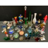 Coloured glassware; Murano clowns; glass animal paperweights; vases; etc
