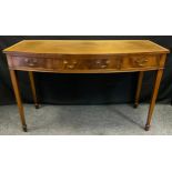 A 20th century, George III reproduction Walnut and mahogany bow-front console table, three