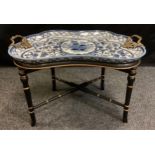 A 20th century empire style serpentine top serving table, pottery tray top with gilt metal