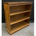 A Priory style oak three tier bookcase, 100cm tall x 97cm wide x 30.5cm deep.