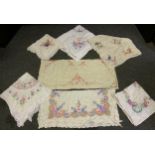 Hand embroidered floral linen tablecloths including English country garden flowers, crinoline lady