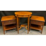 A George III reproduction mahogany oval side table, tapering square legs, oval under-tier, satinwood