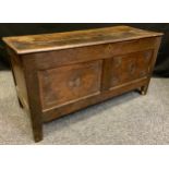 An 18th century oak blanket chest, 113cm wide x 45cm deep x 58.5 tall.