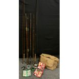 A J H Kelly of Hyde two piece fibre glass fishing rod, 9'6" long; others Daiwa, two piece, 10'6;