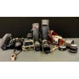 A Praktica B100 SLR camera body, 50mm lens; others 70-210mm, Optomax 300mm, Prinz Galaxy 200mm;