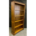 A Priory style tall oak bookcase, four removable shelves, 195cm tall x 100cm wide x 26.5cm deep.