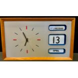 A mid 20th century E A Combs calendar wall clock, silvered dial, day, date and month apertures