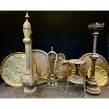 A large Persian coffee pot, 107cm high; brass trays; two tier stand; fan fire guard; etc
