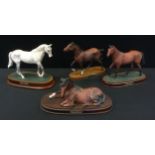 A Royal Doulton model, Spirit of Fire, mahogany base; others, Spirit of Peace; Red Rum, no. DA18,