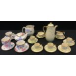 A Grays pottery hand painted duet set, painted with blue and pink flowers, comprising, teapot, large