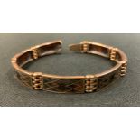 A 9ct gold and tortoiseshell panel bracelet, stamped W.H.W Ltd 9ct, made in England, 16.5cm long,